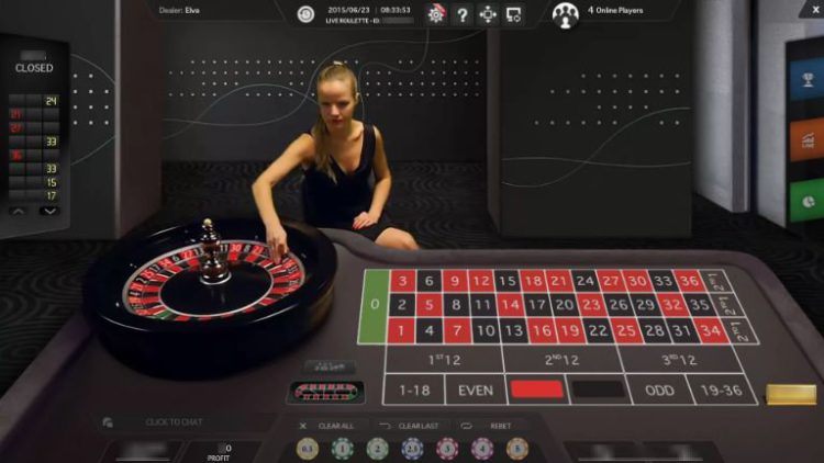 Ekran komputera z widokiem wirtualnej ruletki online — automat ruletka z planszą do obstawiania i kołem ruletki