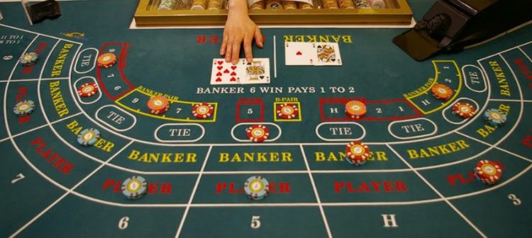 Stół do bakarata online z widocznymi polami zakładów na gracza, bankiera i remis