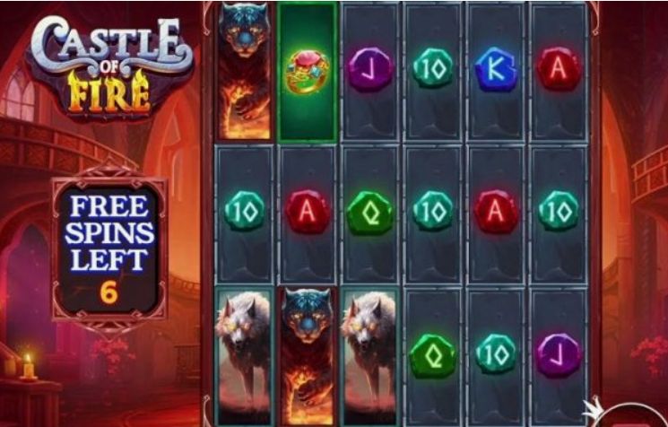 Castle Of Fire: sześć bębnów na tle zamku i ognistego nieba