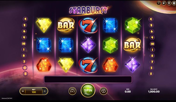 Starburst na ekranie komputera z kolorowymi klejnotami, gwiezdnym tlem i ukladem 5x3